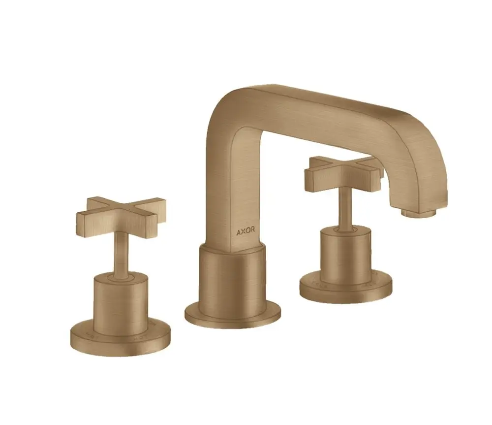 Dreiteilige Armatur mit flachem Auslauf und Kreuzgriffen, aus gebürstetem Bronze, deutlich erkennbar das AXOR-Logo auf der Oberseite der Teile.